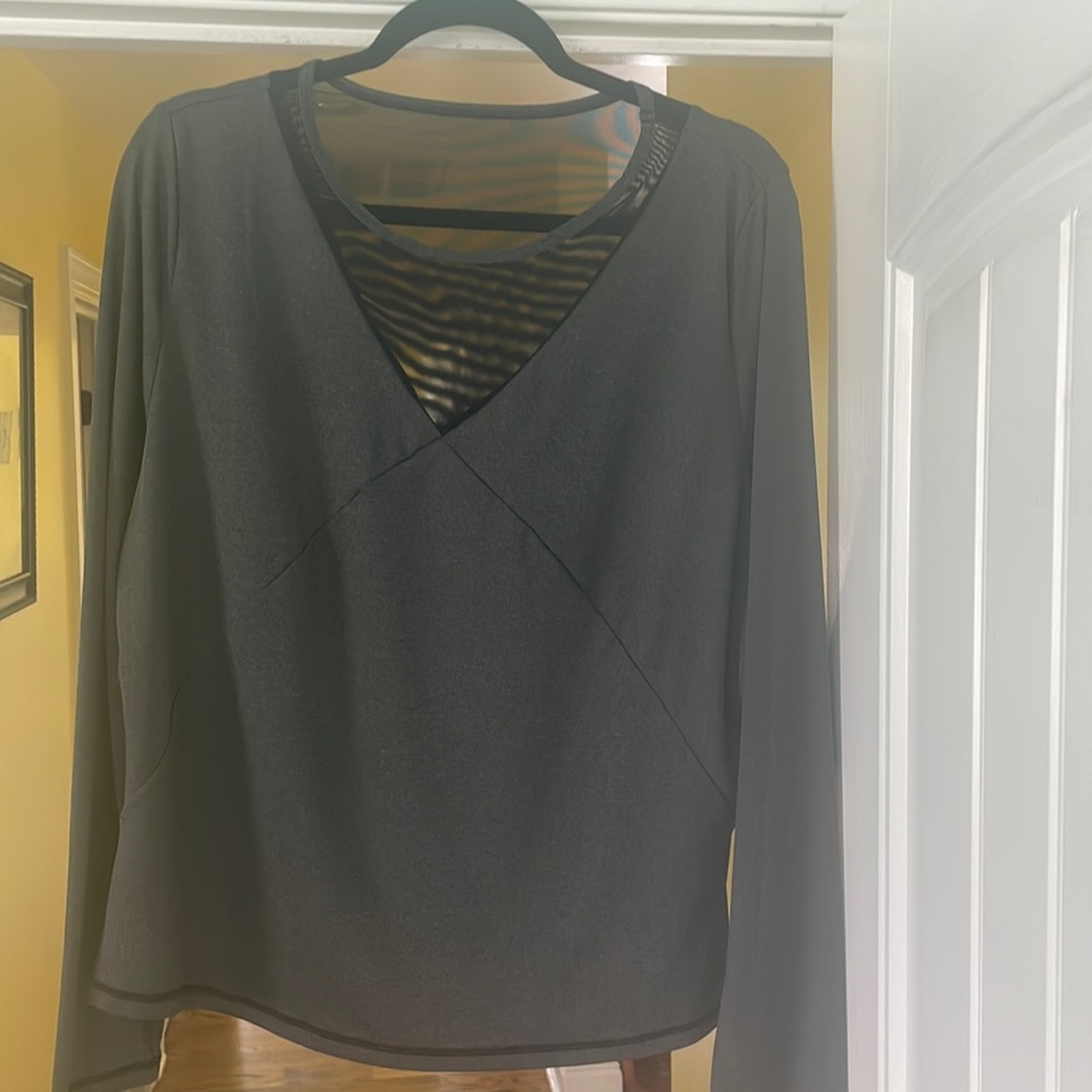 Dress up or down with this cute grey & mesh casual or workout coverup.